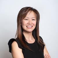 Fanny Dunagan testimonial An Asian woman in a black top smiling