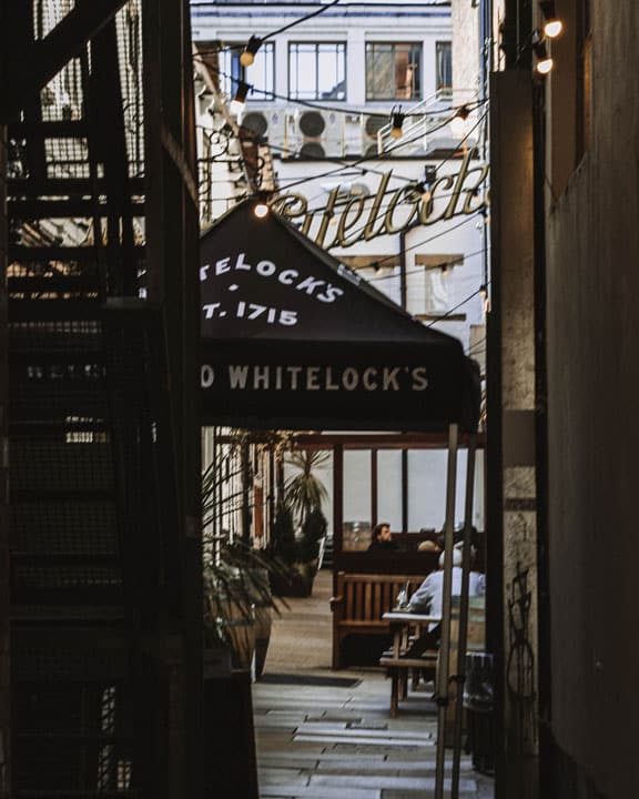 whitelocks an entrance to a pub down an alley to leeds' oldest pub whitelocks